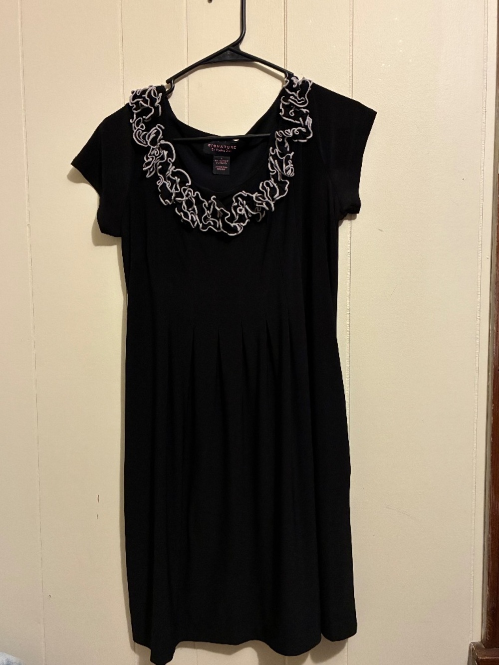 Elegant black dress by Signature by Robbie Bee